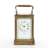 A 19th century French carriage clock, the white enamel Roman dial with arabic five mintues inscribed