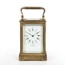 A 19th century French carriage clock, the white enamel Roman dial with arabic five mintues inscribed