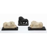 A pair of 19th century carved alabaster recumbent lions each 15cm in length x 8.5cm high together