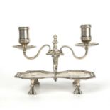 An 18th century silver plated snuffer stand and candelabra in Huguenot style with caryatid
