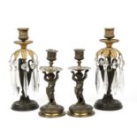 A pair of 19th century bronze and gilt metal candlesticks with cut glass drops, each 26.5cm high