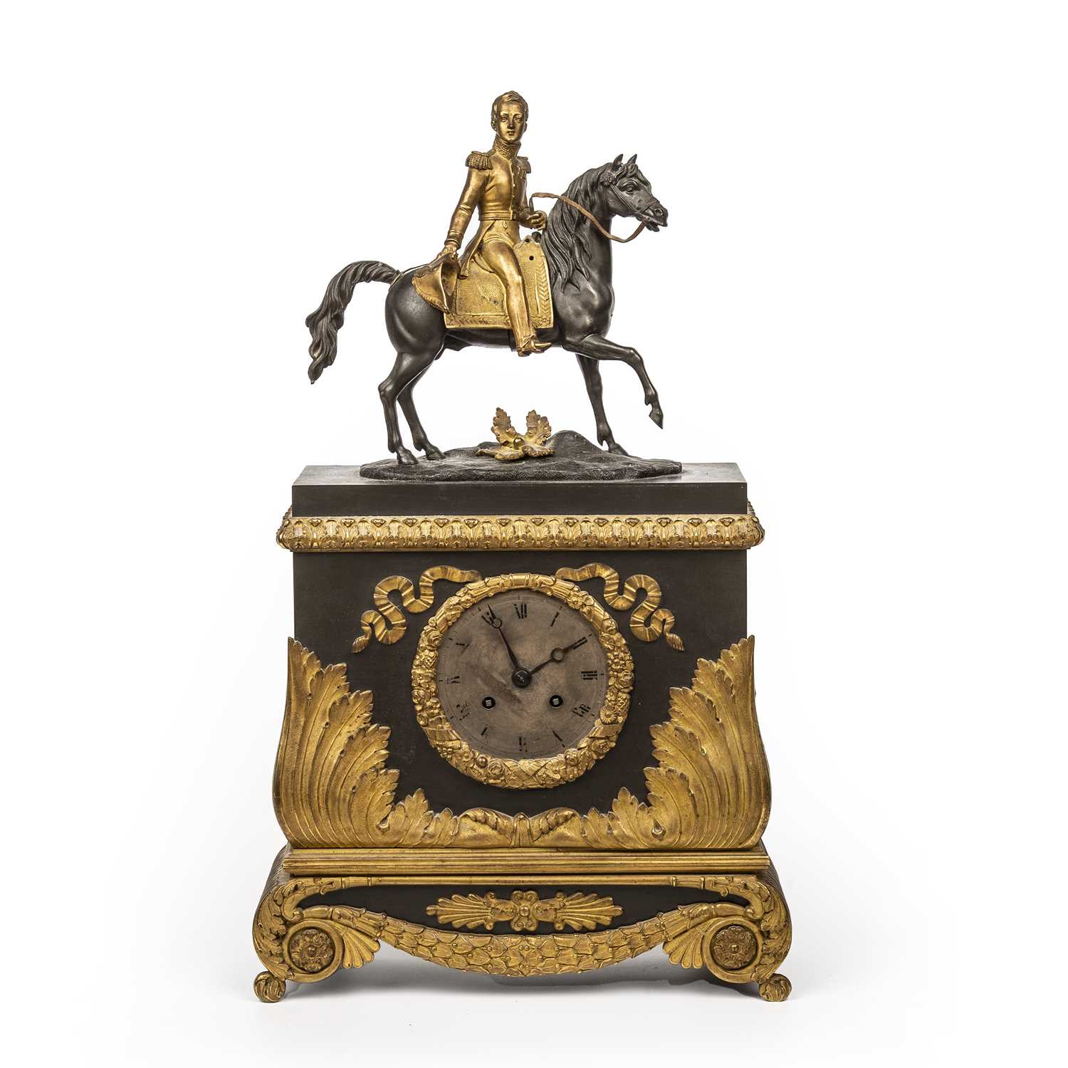 A 19th century French mantel clock with silvered Roman dial, drum movement with silk suspension