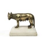 A 19th century Italian Grand Tour gilt model of the Capitoline Wolf mounted on a stepped white