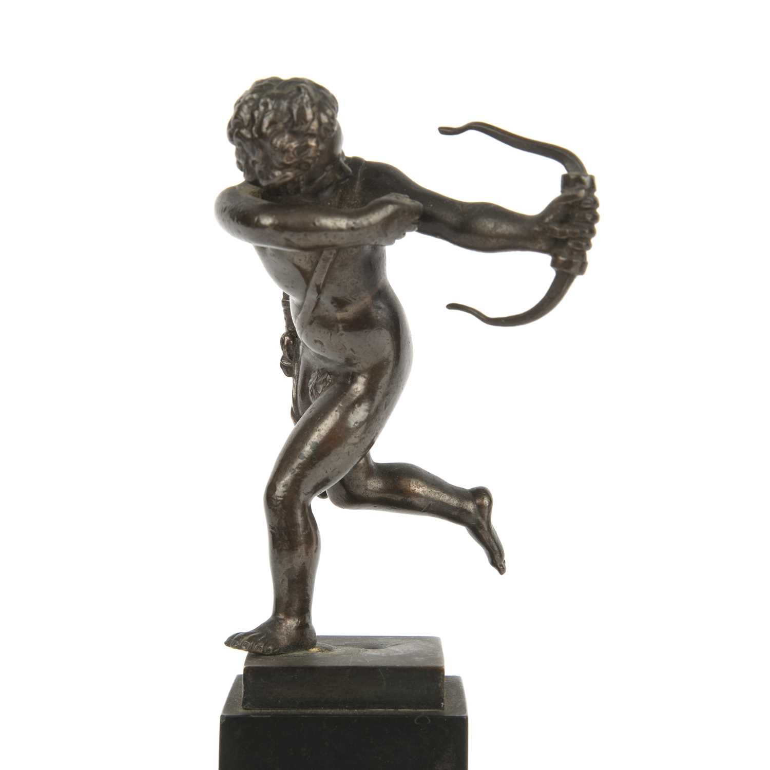 A 17th or 18th century or later bronze depicting cupid on a slate and hardstone base, in the - Image 2 of 5
