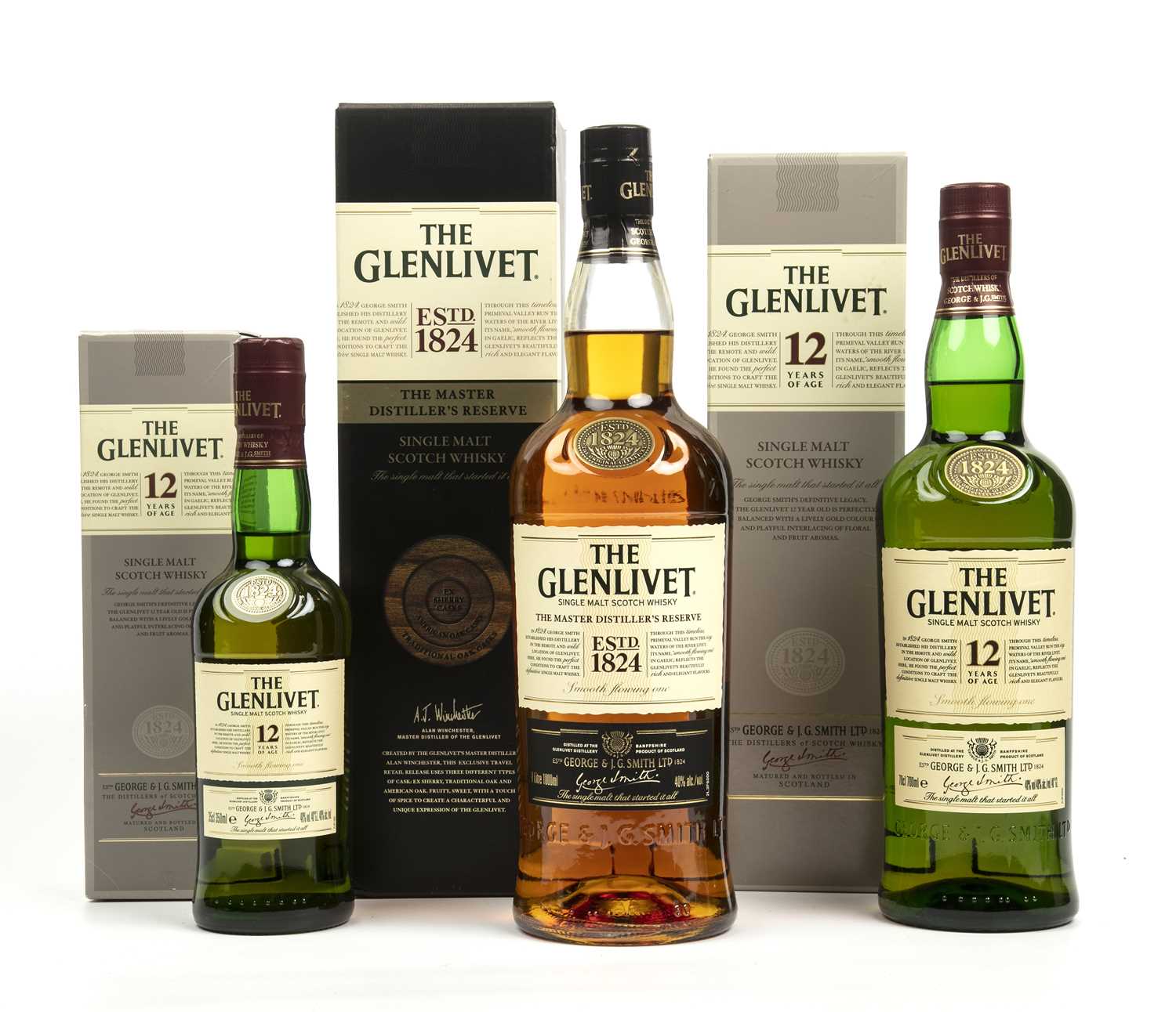 A bottle of Glenlivet, a 1ltr bottle of The Master Distillers Reserve single malt Scotch whisky with