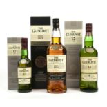 A bottle of Glenlivet, a 1ltr bottle of The Master Distillers Reserve single malt Scotch whisky with