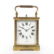 A Late 19th century French carriage clock with a white enamel roman dial inscribed J.C Vickery to