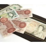 An assortment of six bank notes including uncirculated wren £50 note.At present, there is no