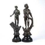 Two late 19th century French spelter figures a farmer and a fisherman, each on ebonised wooden