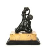 A late 18th / early 19th century Grand Tour bronze of a young Hercules wrestling a python, after the
