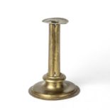 A late 17th century brass candlestick of cluster column form, 16cm diameter x 24.5cm highLead filled
