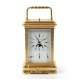 A modern L'epée gilt brass carriage clock retailed by Mappin & Webb with white enamel Roman dial,