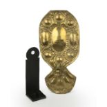 A 18th century continental sheet brass repousse wall sconce, 22cm wide x 45cm high together with a