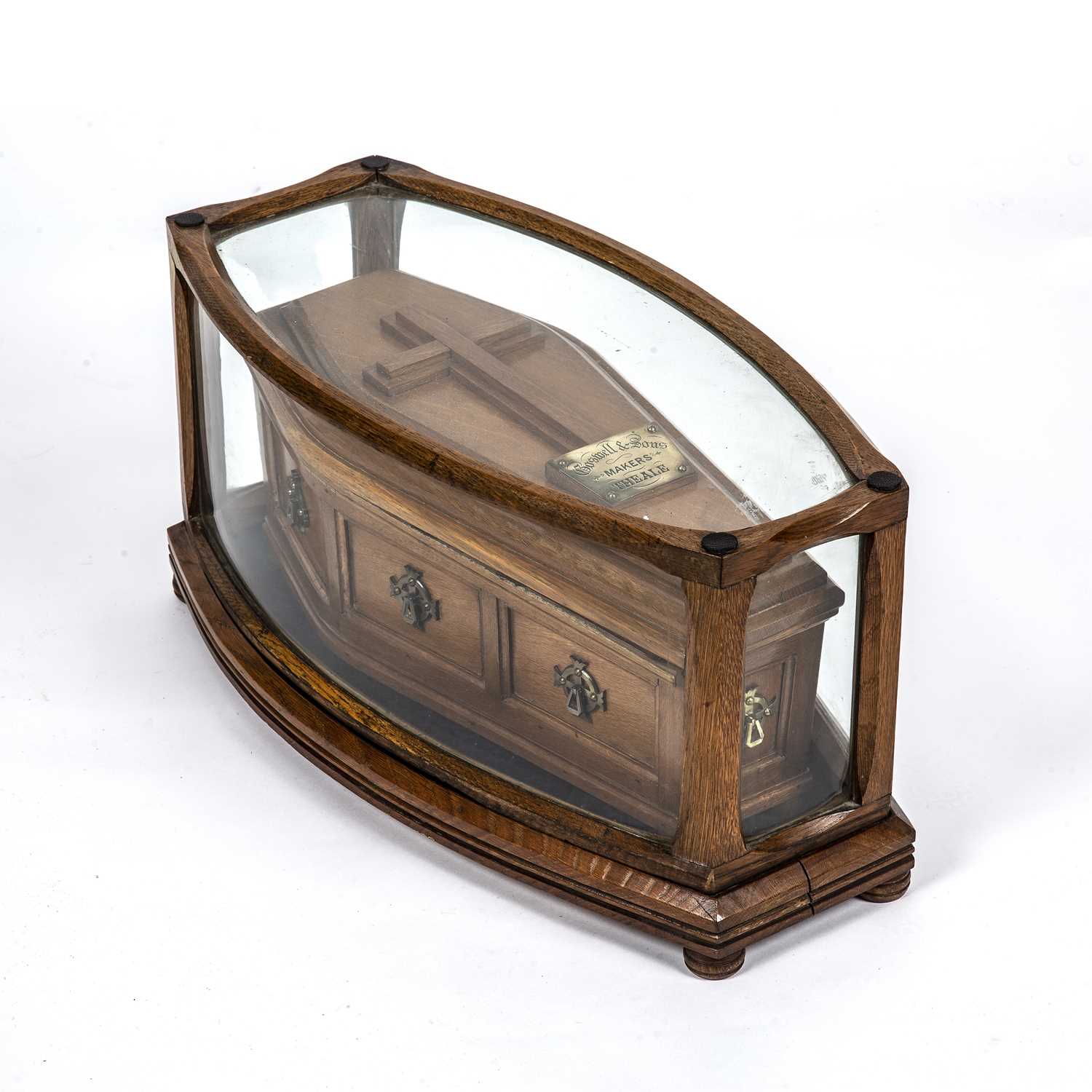 A Victorian oak model display coffin for Boswell and Sons, makers Theale, with a fitted glazed case,
