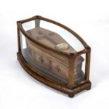 A Victorian oak model display coffin for Boswell and Sons, makers Theale, with a fitted glazed case,