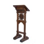 A mid 19th century Gothic oak revival lectern, 59cm wide x 46cm deep x 140cm highCondition good with