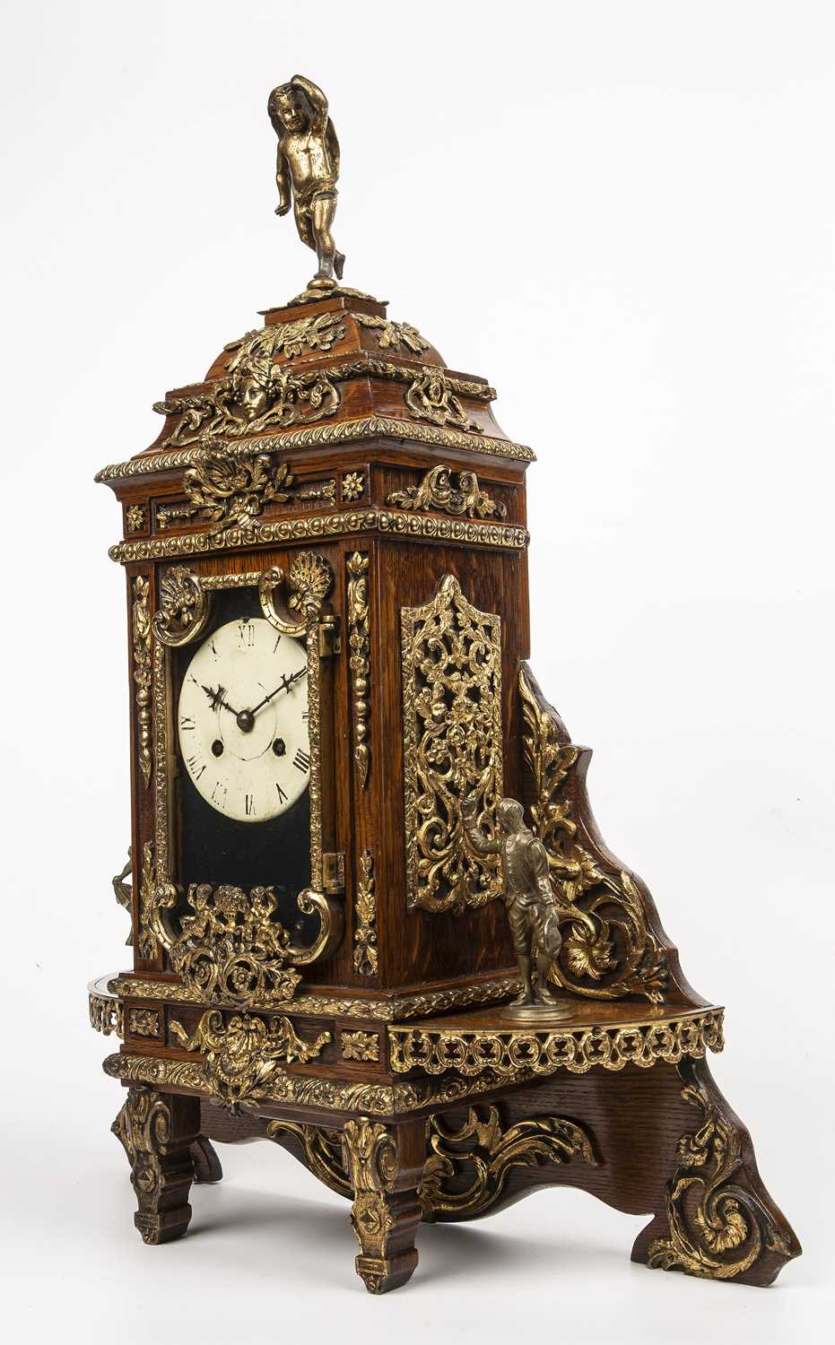 A late 19th century continental oak cased mantle clock with gilt metal figural decoration. 46cm wide - Image 3 of 4