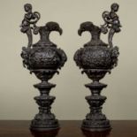 A pair of antique French Renaissance-style bronze ewers, decorated with classical scenes, 50.5cm