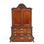 A late 18th Century Dutch apprentice cabinet with twin door above four long drawers 47cm wide 22cm
