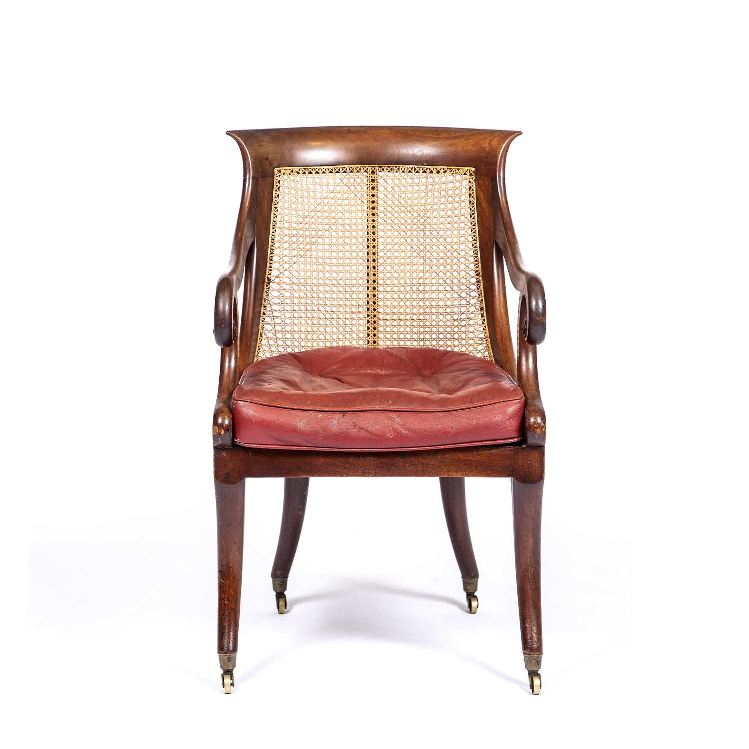 A Regency mahogany bergere library open armchair with a caned back and seat, scrolling arms, sabre - Image 2 of 11