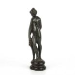 A late 17th / early 18th century bronze Venus on a later turned wooden socle, overall 4cm wide x