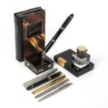A Mont Blanc Meisterstuck number 149 fountain pen, serial number HD1024740 with a desk holder and