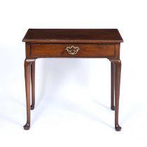 A George III mahogany single drawer side table with turned legs and pad feet, 75cm wide x 45cm