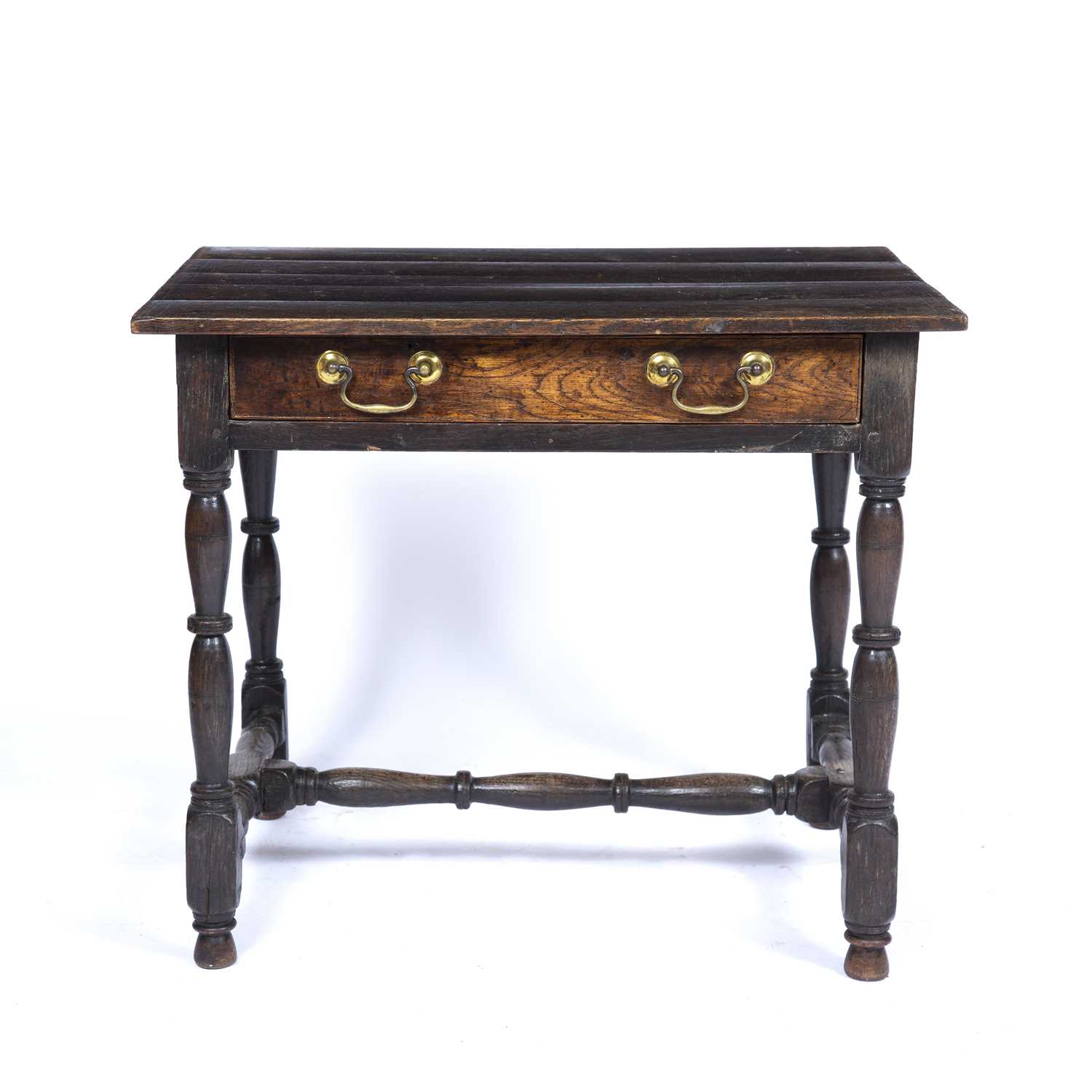 An 18th century oak side table with a single drawer and turned supports, 76cm wide x 59cm deep x