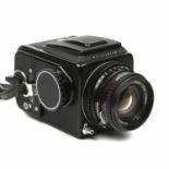 A Hasselblad 500C/M medium format camera with a Carl Zeiss Planar f/2.8 f=80mm Nr 6273829
