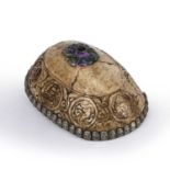 A Tibetan Kapala bowl with metal lining and carved decoration, 19cm wide x 13cm deep