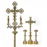 A 20th century gilt brass Gothic revival altar cross set with cabochons, 31cm wide x 81cm high;