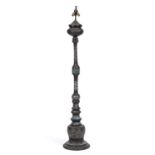 An antique eastern bronze standard lamp with champleve enamel decoration, 172cm in heightNeeds
