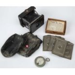 A Vest-pocket Tenax camera patent 17624.08 with seven slides and a Watkins Bee meter together