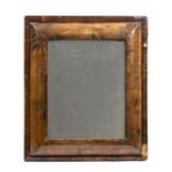 A 17th century style walnut cushion moulded wall mirror, 47cm wide x 57cm high