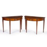 A pair of George III style satinwood demi lune side tables each with segment veneered tops, inlaid