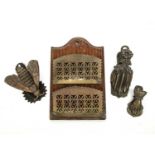 Victorian pressed metal letter clips one in the form of a moth, 9cm wide x 11cm in length together