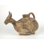 A pre-Columbian pottery vessel in the form of a horned animal, 30cm wide x 15cm highFor restoration