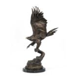Jules Moigniez, bronze of an eagle taking flight, mounted on a marble base. 30cm wide 80cm high