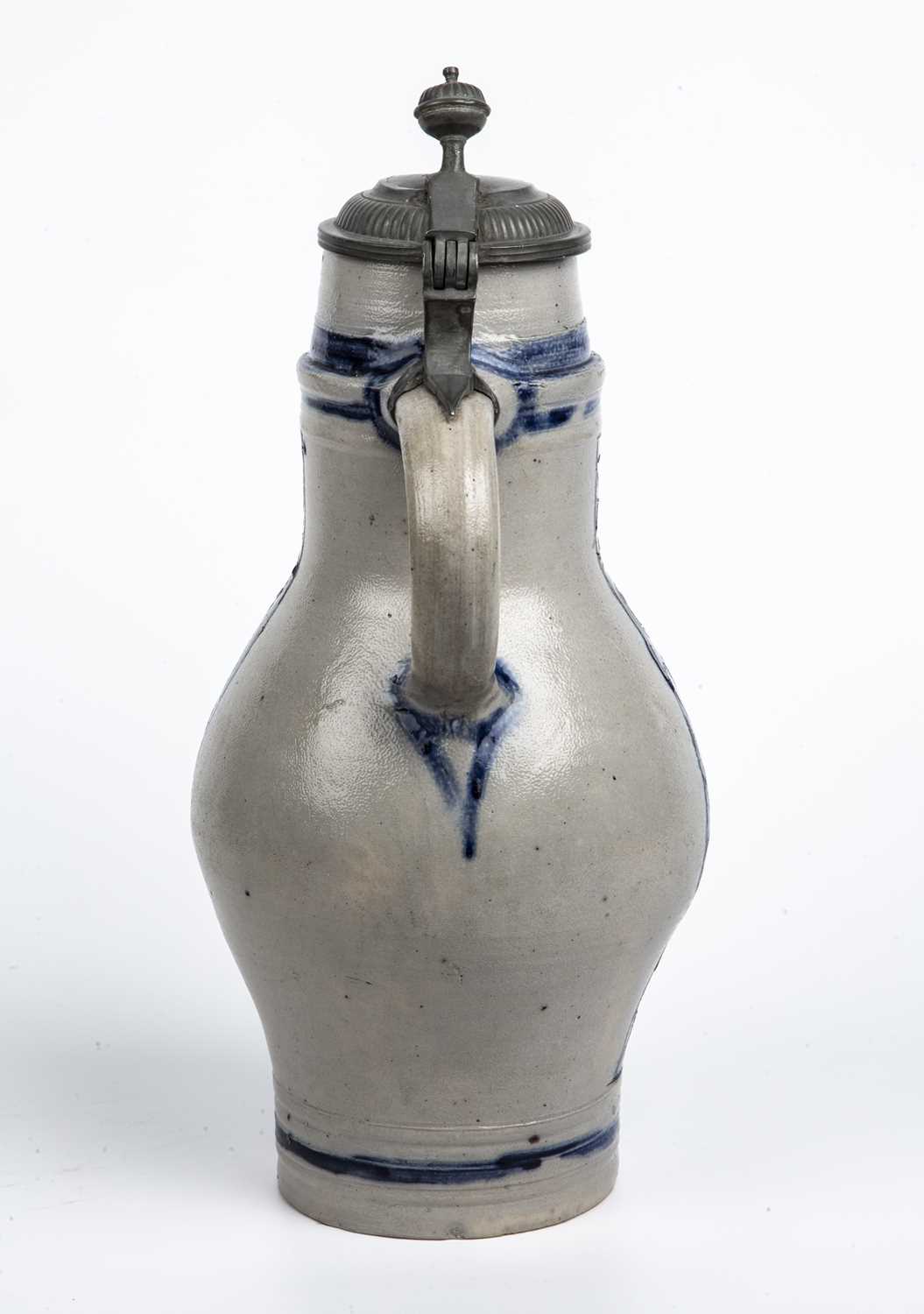 An 18th century Westerwald stoneware jug with a pewter cover, 18cm wide x 38cm high - Image 4 of 7