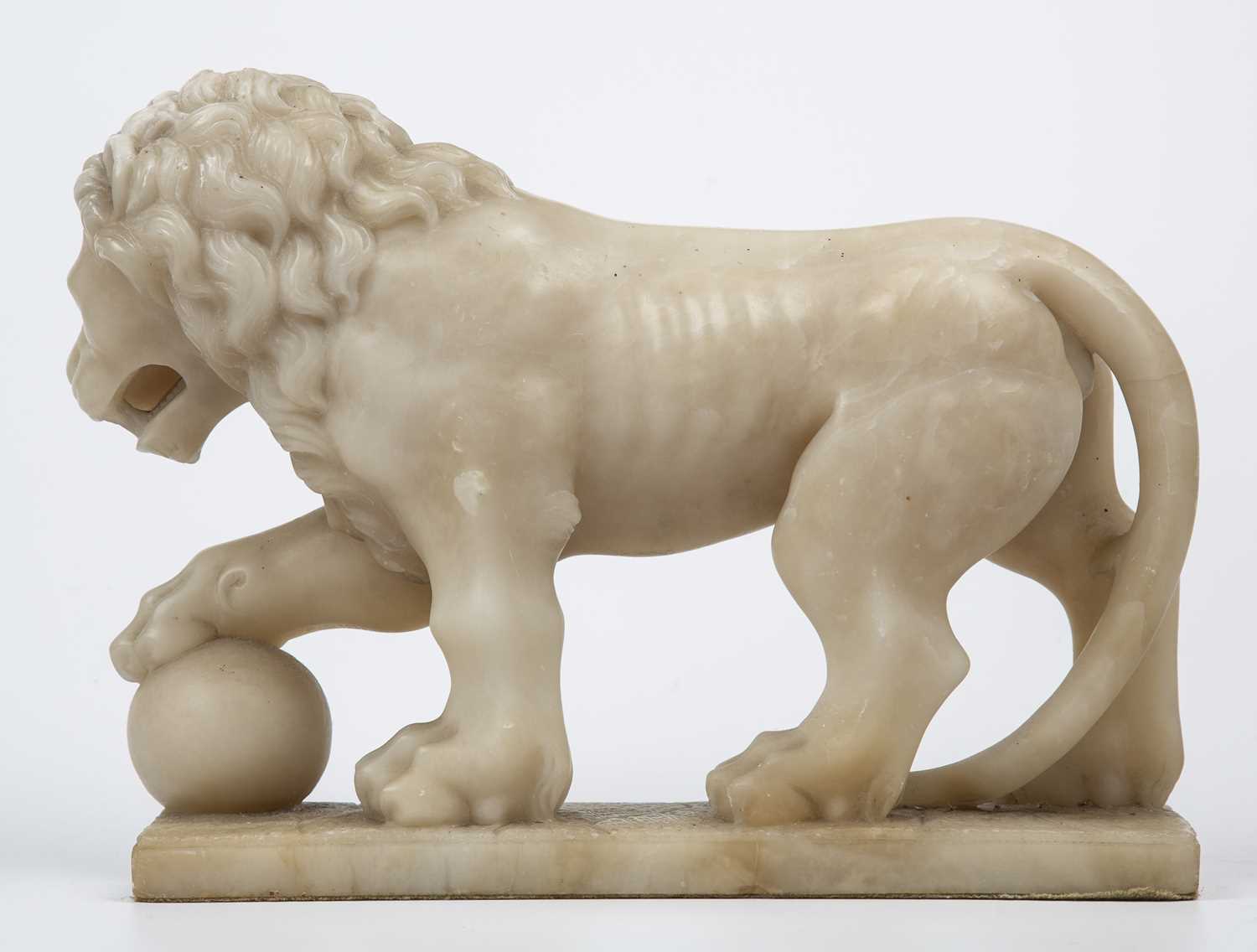 A late 18th/early 19th century carved alabaster lion 35cm wide x 25cm highSome hairline cracks to - Image 4 of 4