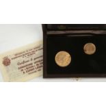 A San Marino cased coin pair comprising of a gold 1 scudo and a 2 scudi, 1983At present, there is no