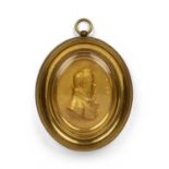 A George III gilt bronze oval bas-relief portrait of a gentleman by in a heavy glazed frame