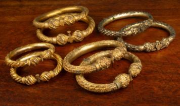 A collection of four pairs of Indonesian style anklets