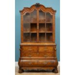 An 18th century Dutch marquetry display cabinet