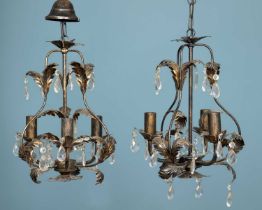 A pair of French bronzed "Marie Thérèse" three-light chandeliers