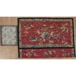 Two Chinese embroidered silks with floral decorations, one on a red ground with a black border,