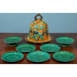 A set of Wedgwood dessert plates; and a Minton-style cheese dome