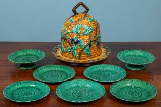 A set of Wedgwood dessert plates; and a Minton-style cheese dome