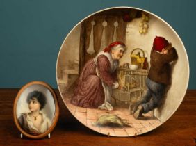 An oval portrait of a woman on porcelain together with a porcelain plate by T T & Co