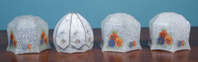 A set of three early to mid 20th century French glass hexagonal lampshades decorated with flowers;